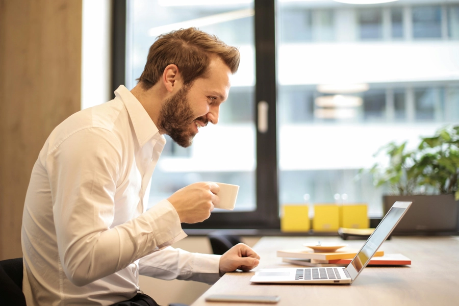 Happy person with laptop